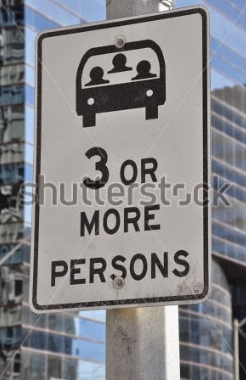  A freeway on-ramp is marked with this white sign. Which of the following vehicles may use this lane: 